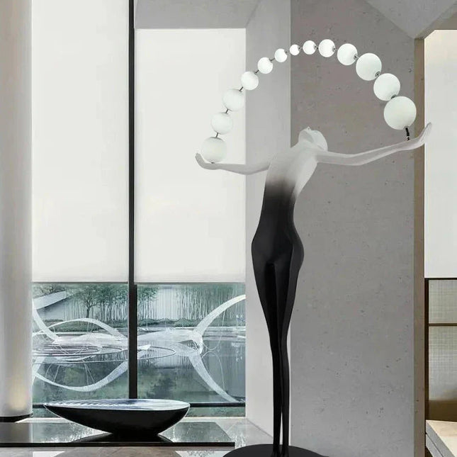 ChandelierDecor - Humanoid Sculpture Holding Ball Floor Lamp